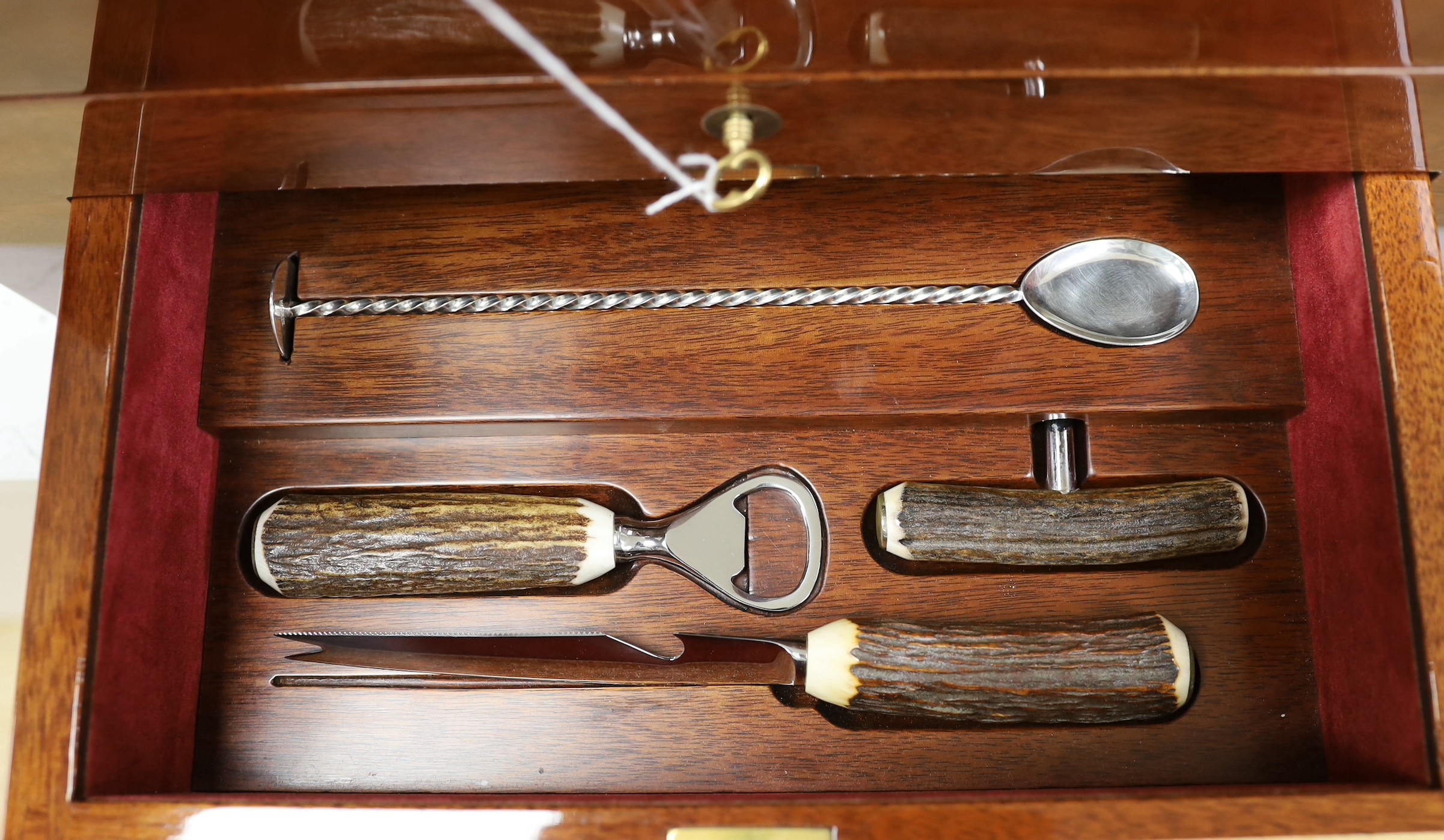 An inlaid travelling decanter box, with lower drawer and a set of Royal Doulton glasses